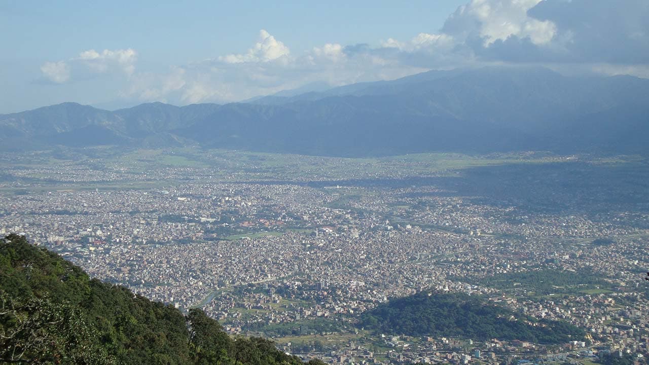 Aerial view of Kathmandu Valley and surrounding hills from the ridge trail.