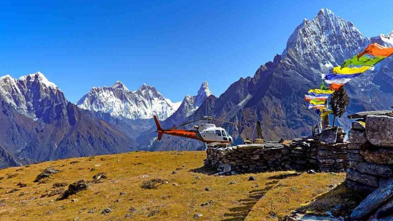 Helicopter landed in the Himalayas on an Everest Base Camp helicopter tour.
