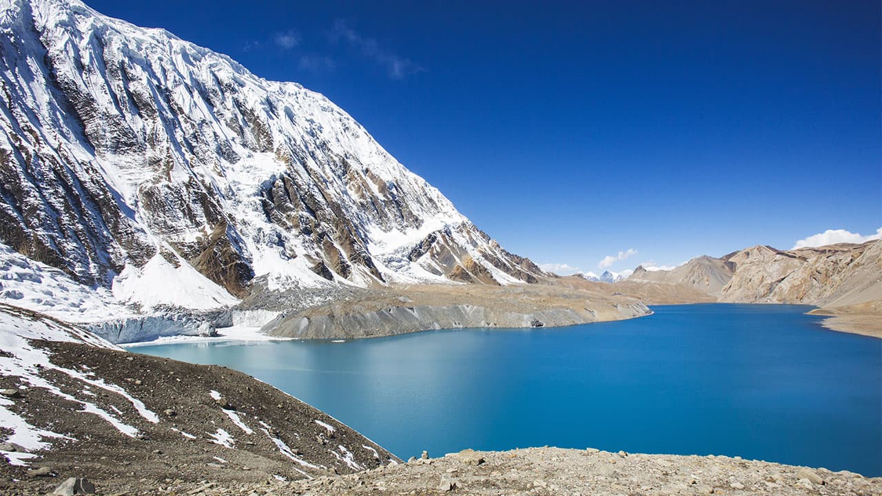 Panoramic view of Tilicho Lake (4,919m) along the Annapurna Circuit in Nepal.