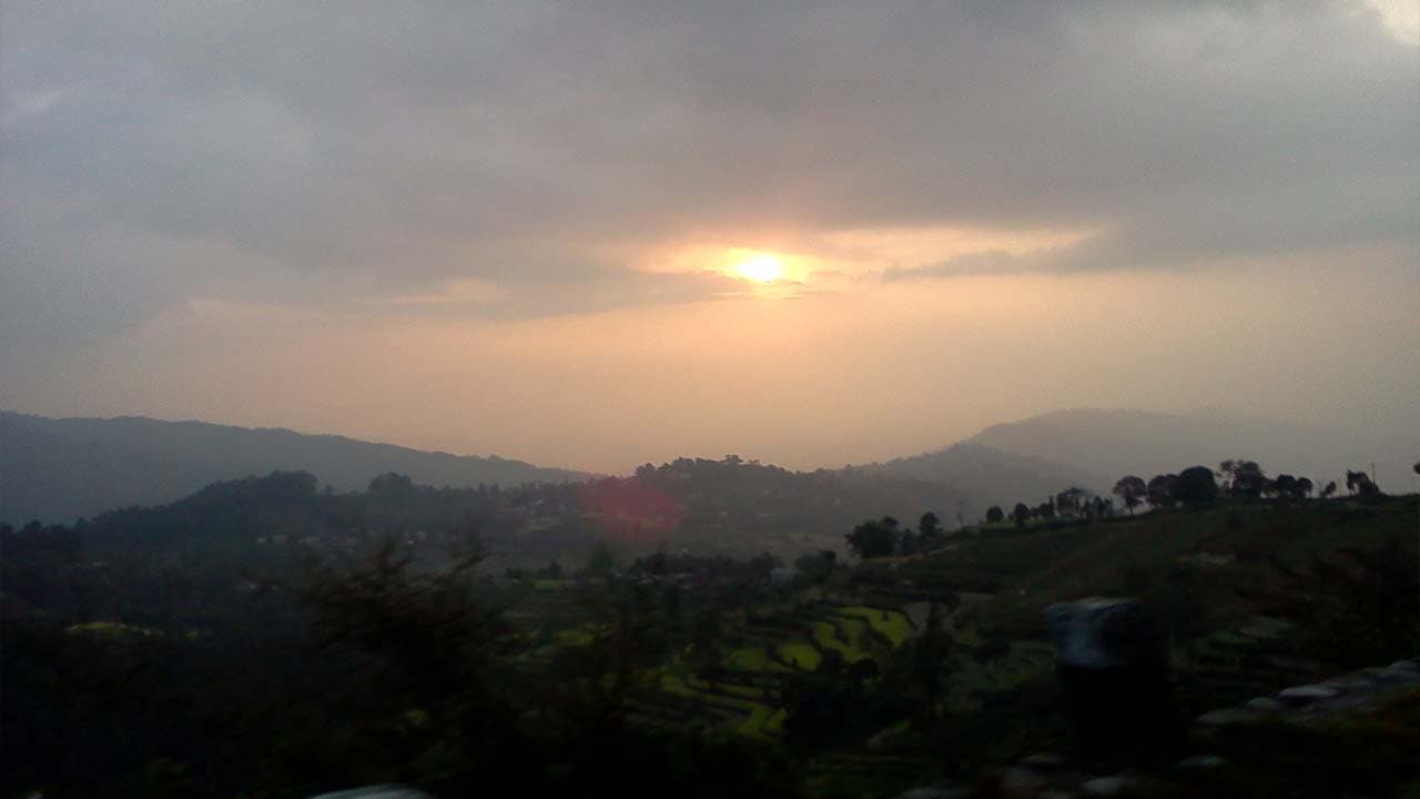 Sunset sky and rolling hills viewed from Nagarkot viewpoint.